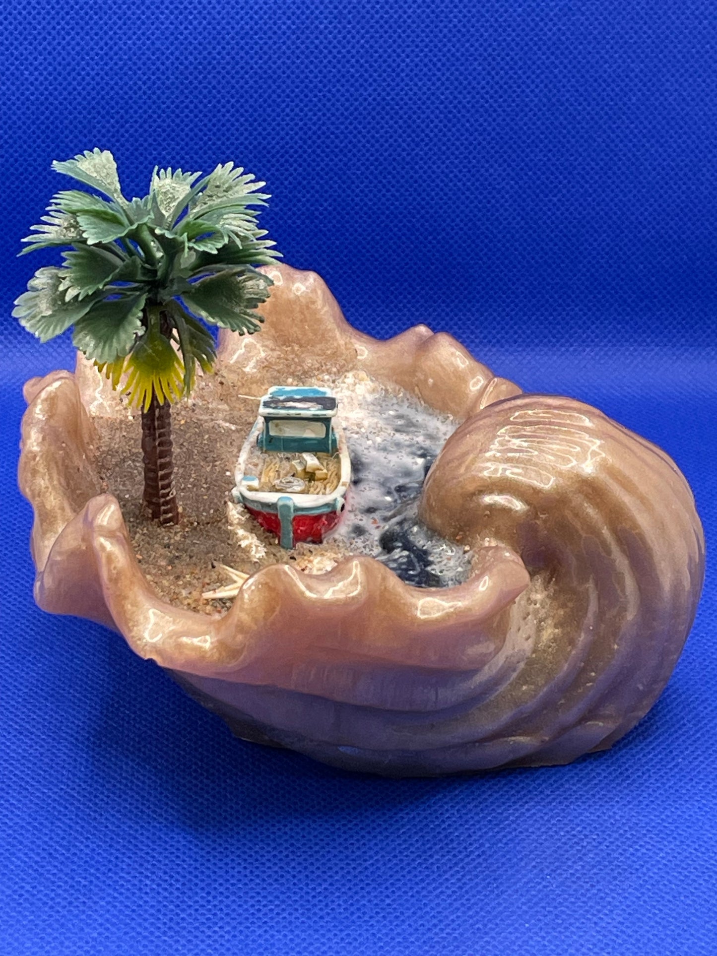 Sea shell with mini beach scene