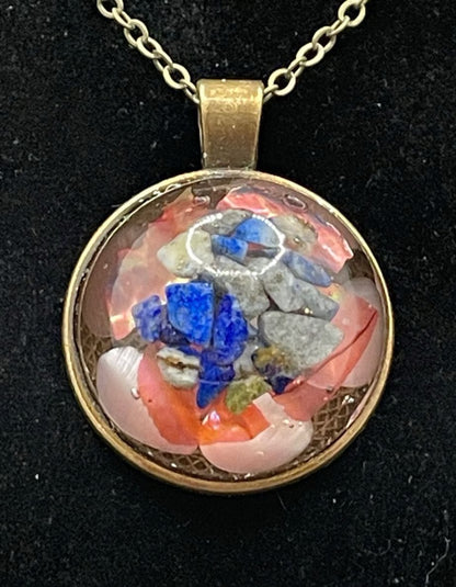 Mineral and abalone shell pendant.