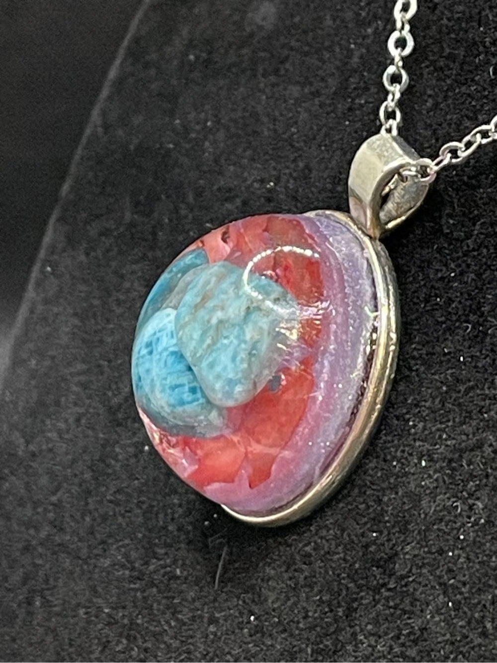 Resin, Mineral, and Abalone Shell Pendant.