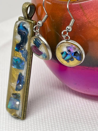 Blue/purple earrings and pendant set.