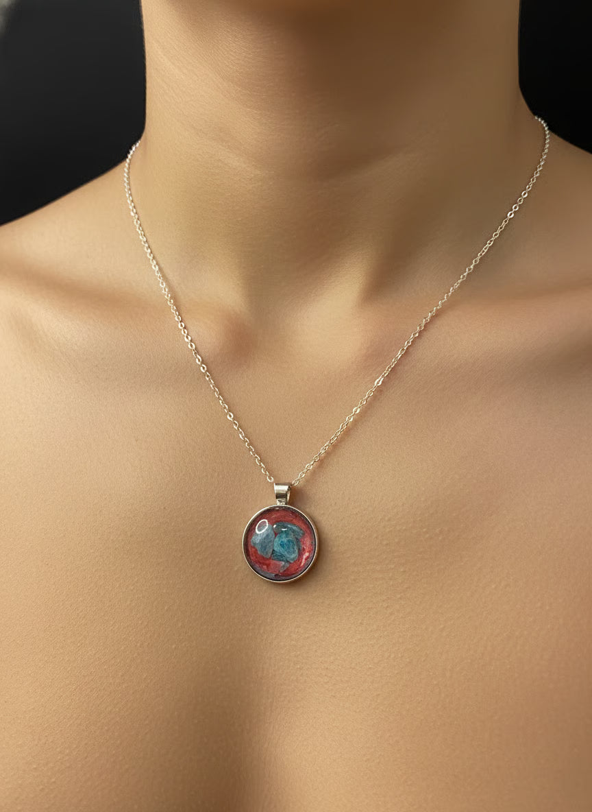 Resin, Mineral, and Abalone Shell Pendant.