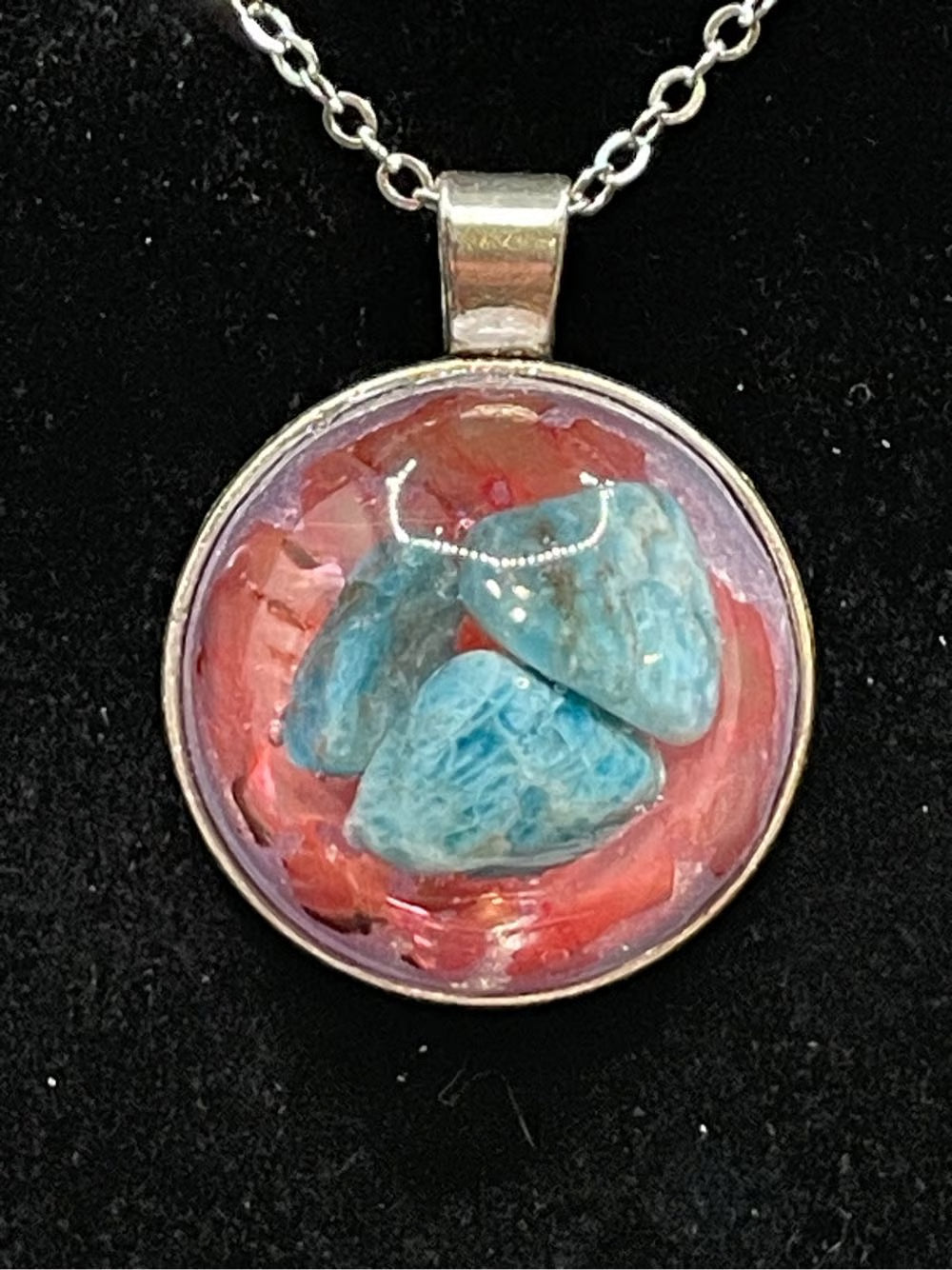 Resin, Mineral, and Abalone Shell Pendant.