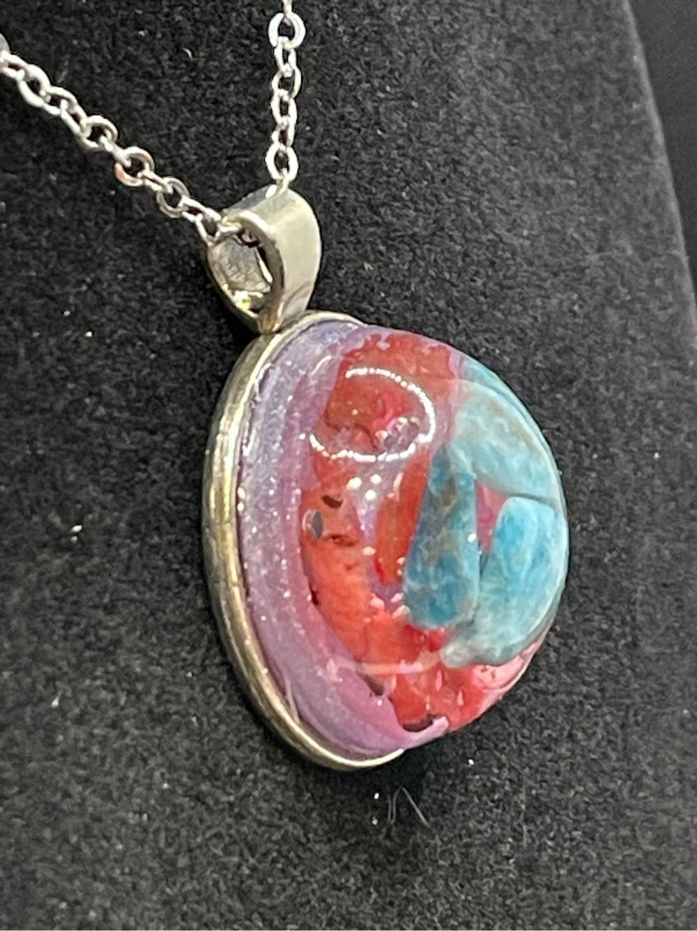 Resin, Mineral, and Abalone Shell Pendant.