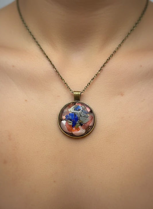 Mineral and abalone shell pendant.